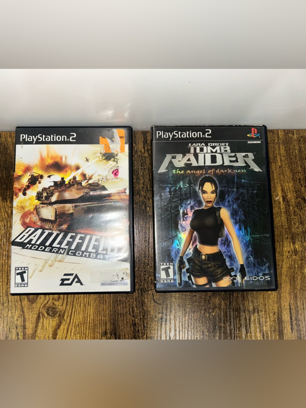 Lot #13 - PS2 Tomb Raider/Battlefield 2 Bundle